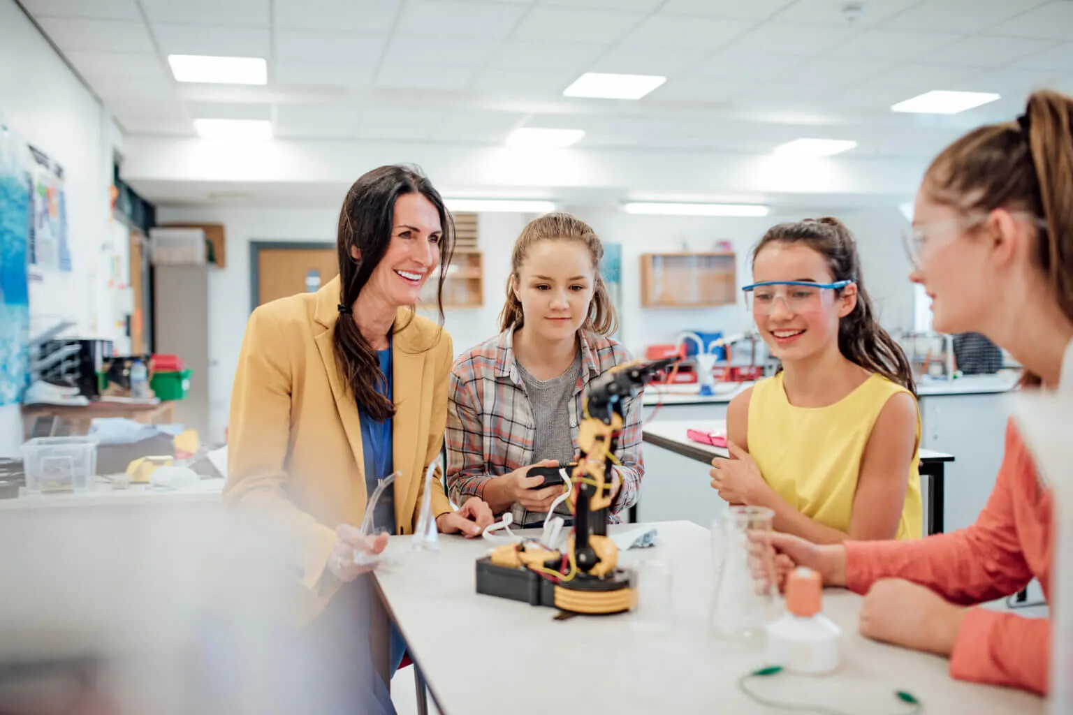Teacher with students in lab class